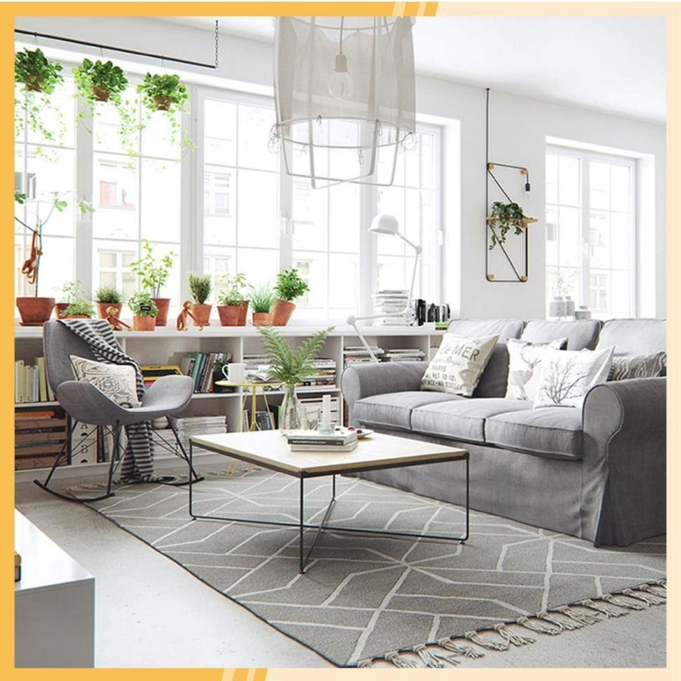 May be an image of sofa, living room and text